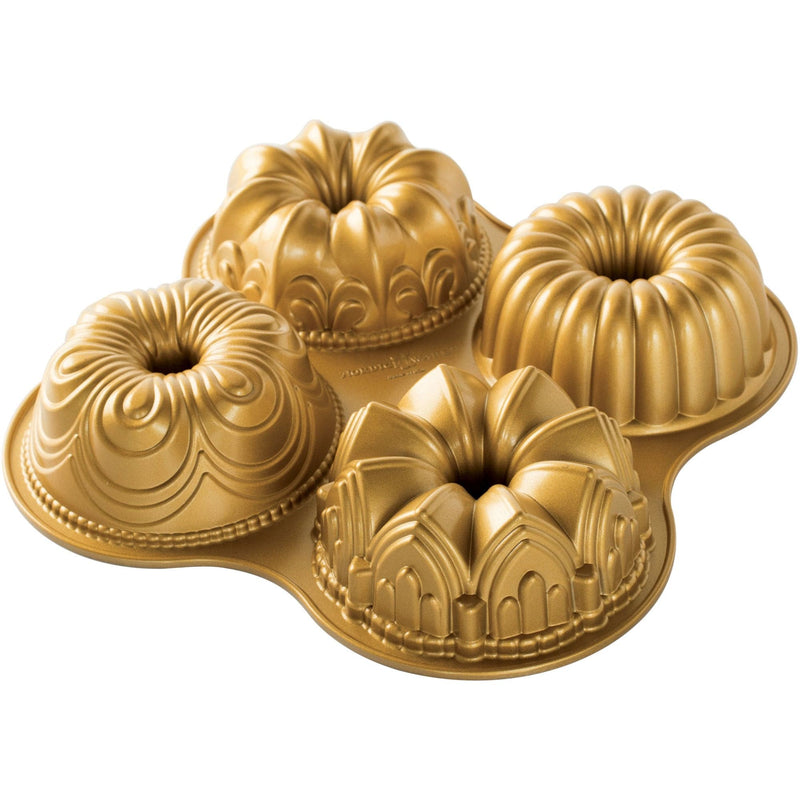 Se Nordic Ware Bundt-bageform m. plads til 4 kager ✔ Stort online udvalg i Nordic Ware ✔ Hurtig levering: 1 - 2 Hverdage samt billig fragt - Varenummer: KTO-NW-91377 og barcode / Ean: &