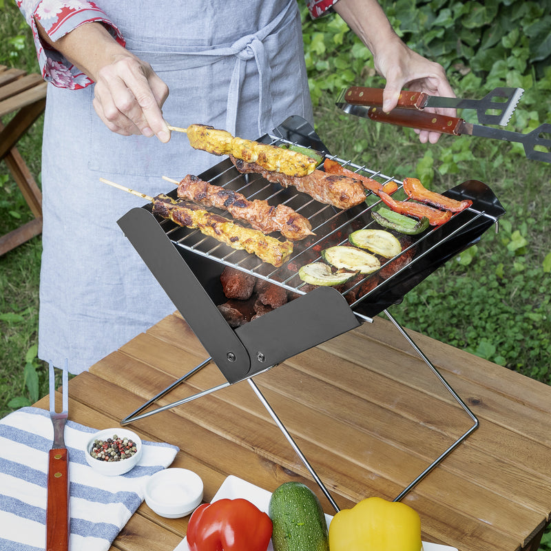 Se Mini Bærbar Grill med rist og stel ❤ Stort online udvalg i InnovaGoods ❤ Hurtig levering: 1 - 2 Hverdage samt billig fragt - Varenummer: CPD-NG33V0103493 og barcode / Ean: &